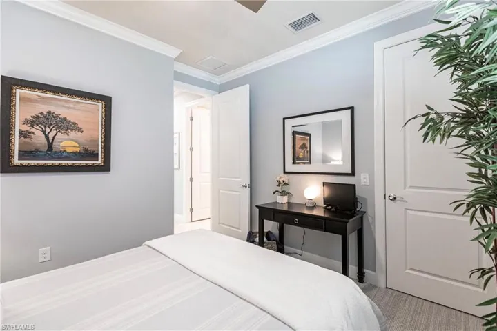Bedroom with crown molding