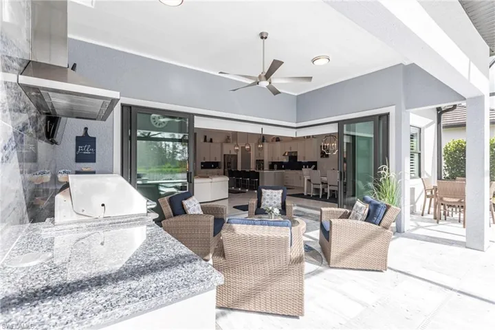 View of patio / terrace with outdoor lounge area and ceiling fan