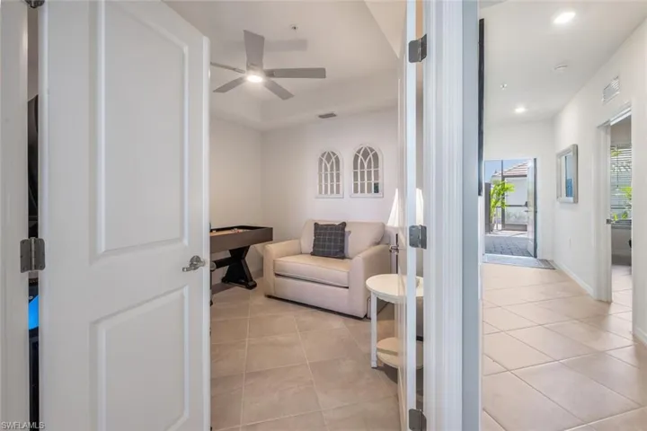 Sitting room featuring visible vents, baseboards, ceiling fan, light tile patterned floors, and recessed lighting