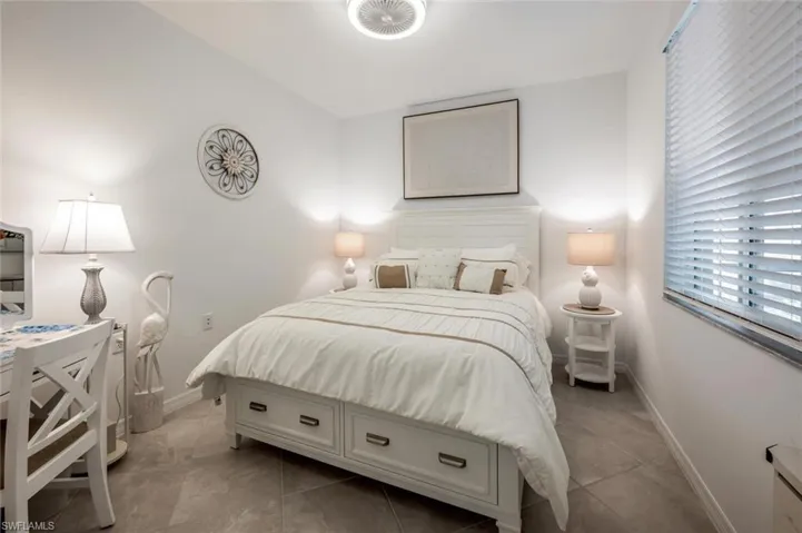 Bedroom featuring baseboards
