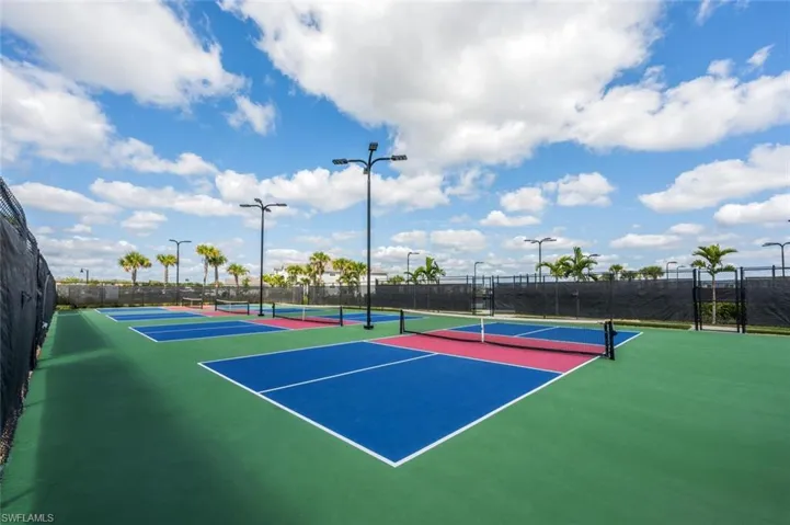 View of sport court with community basketball court and fence