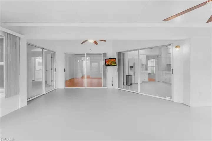 Large airconditioned enclosed lanai with sliding plexin glass windows for letting fresh air in the cooler months.