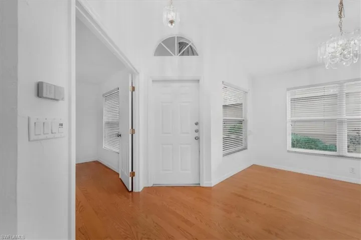 Foyer with wood floors