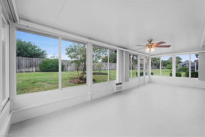 Unfurnished sunroom featuring New A/C unit with sliding windows