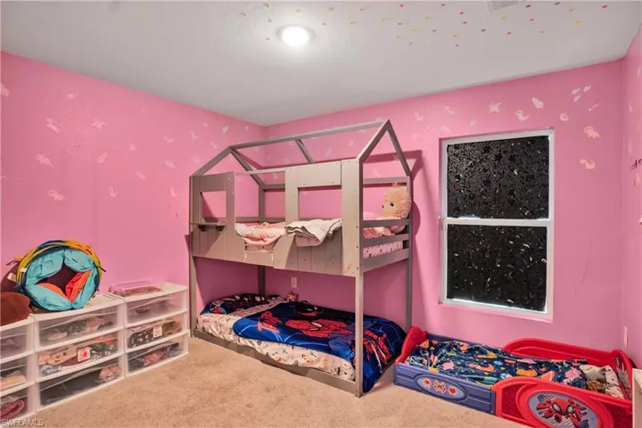 Bedroom featuring carpet
