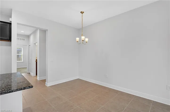 This dining area is right off the kitchen