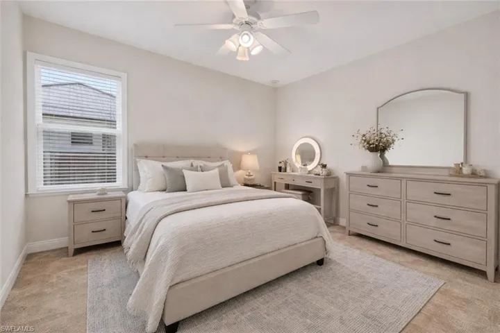 Virtually staged - One of the four bedrooms in this large home