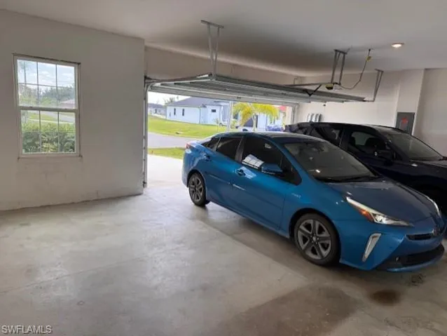 This garage is huge.  Room for two vehicles with plenty of extra room for storage or other toys