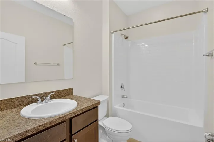 Guest bathroom with tub and shower
