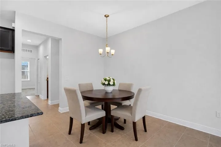 Virtually staged dining space off the kitchen