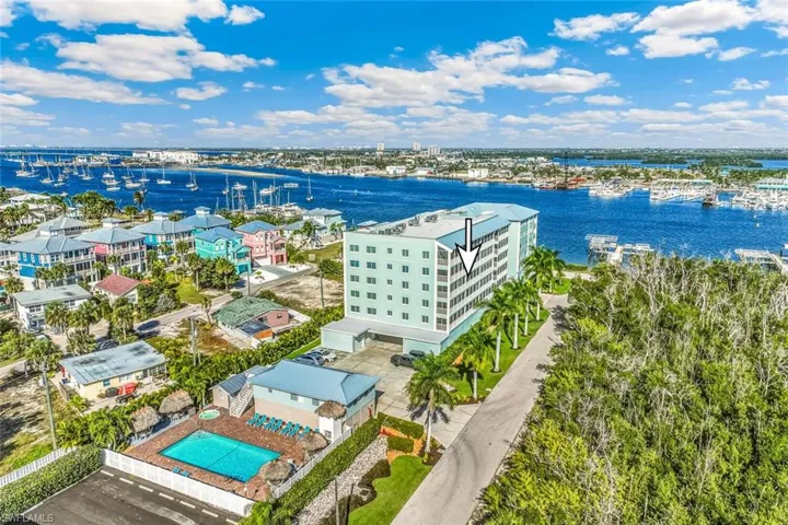 Bird's eye view of a large body of water and a pool area