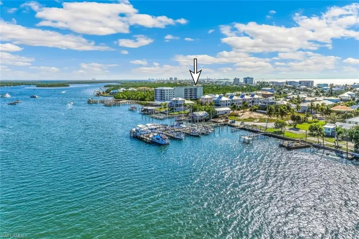 View of urban area featuring a nearby body of water and numerous boat docks