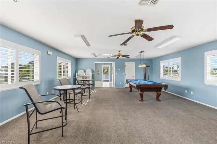 Recreation room featuring a ceiling fan and billiards table