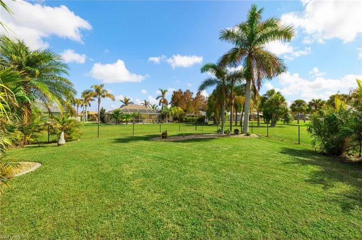 View of yard featuring a lanai