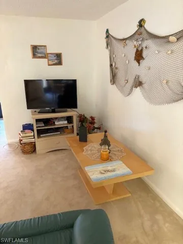 Living area with wall art.
