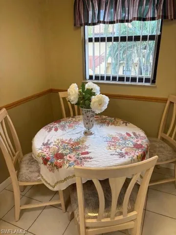 View of tiled eat in kitchen
