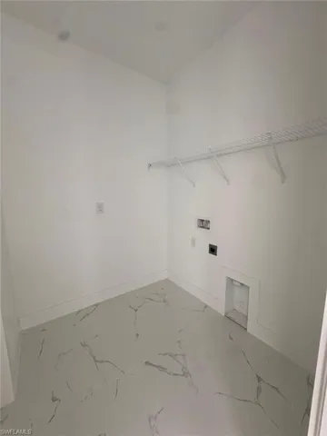 Laundry room with hookup for an electric dryer and washer hookup