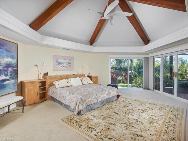 Large primary bedroom, overlooking the pool.