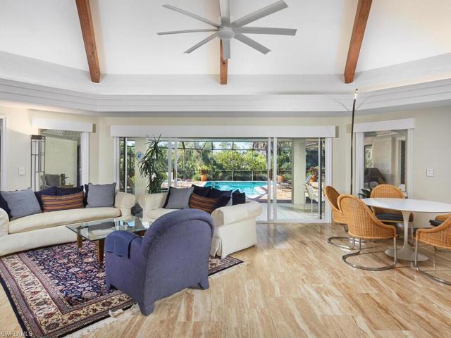 Living, dining and kitchen open to one another.
