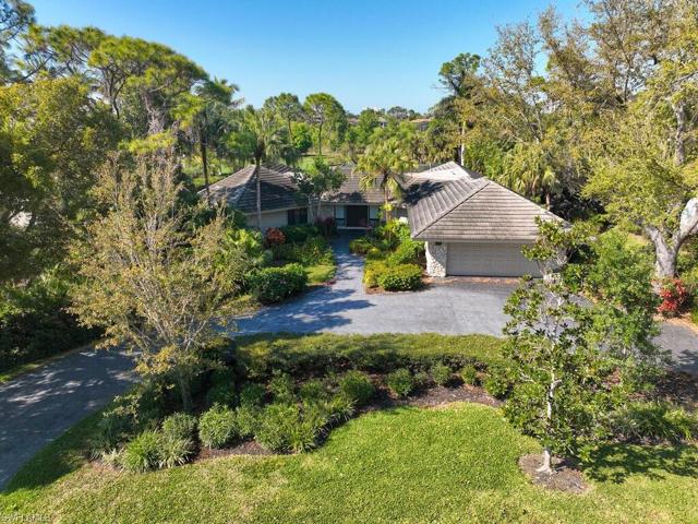 Tucked privately away in the Woodlake community.
