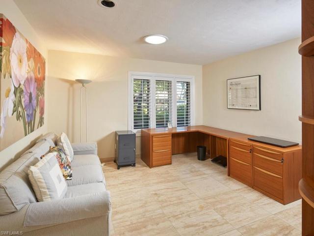 This den is just off the living room and can easily serve as an additional guest bedroom.