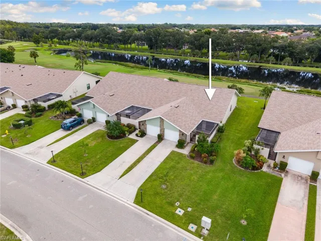 Corner unit with golf course and lake views