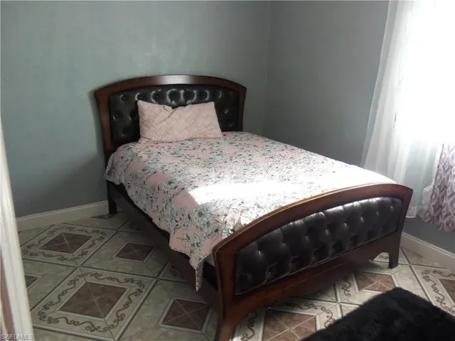 View of tiled bedroom