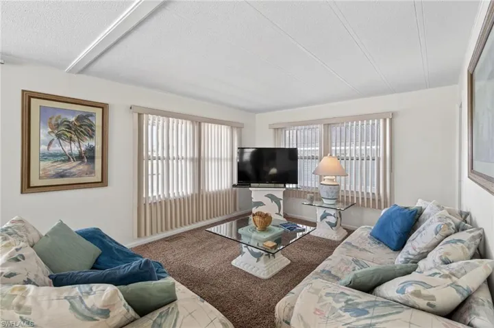 Living area featuring carpet