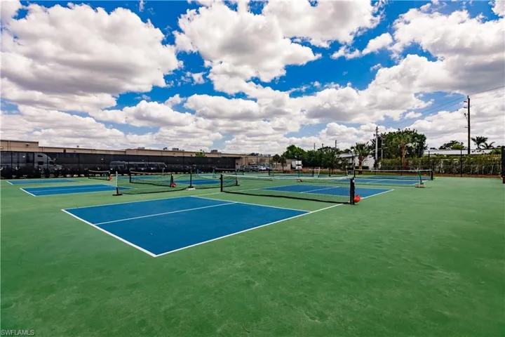 View of pickle ball court with fence