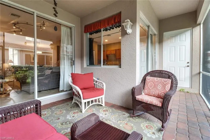 View of patio featuring ceiling fan
