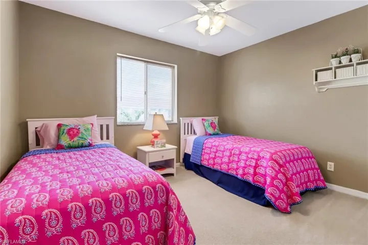 Bedroom with carpet floors and ceiling fan