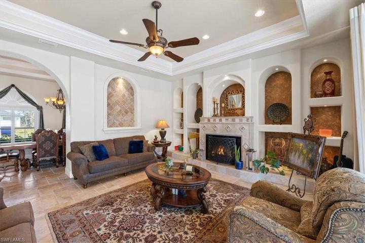 Downstairs living areas open to pool and waterfront.
