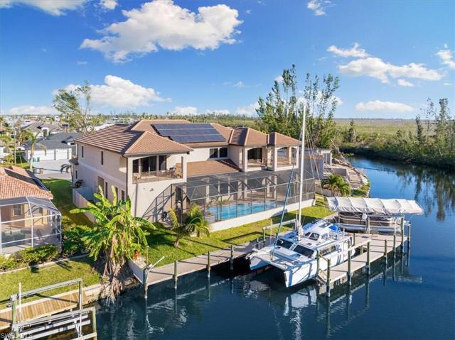 Majestic home on direct sailboat access only moments from open water.
