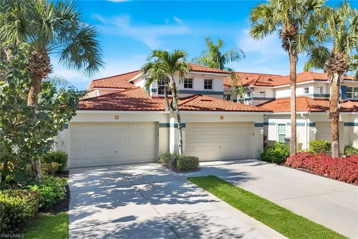 This 2nd story end unit includes a 2 car garage