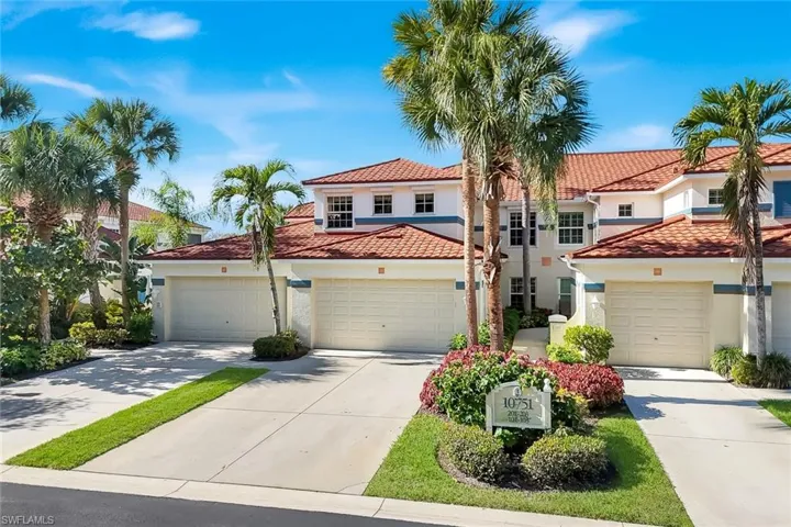 This beautiful 2nd floor end unit features a two car garage and west facing views of the lake and fountains.