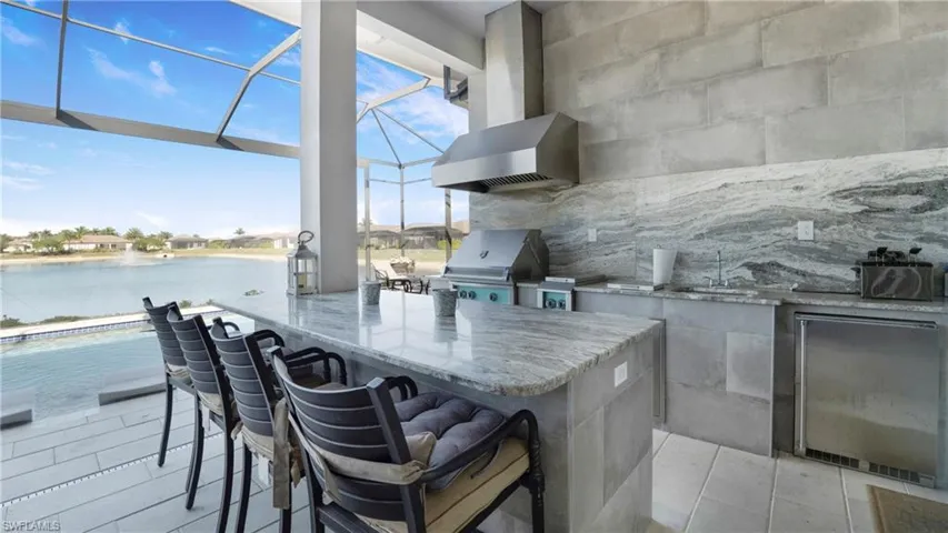 View of outdoor kitchen / Lake View/ Pool