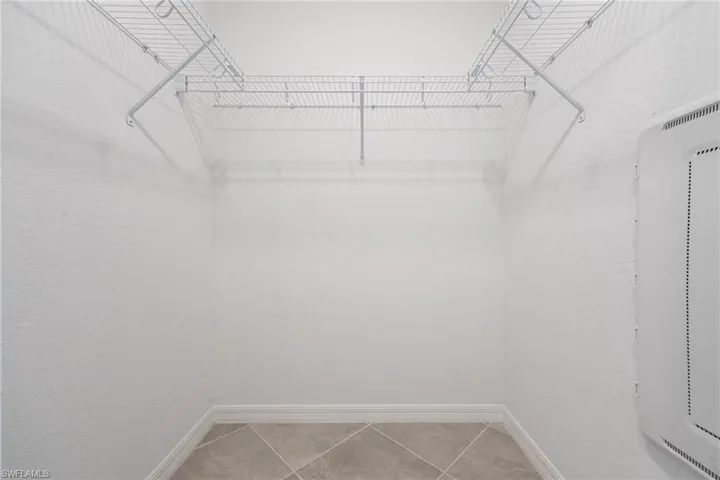 His & Her Walk-in closets in primary bedroom