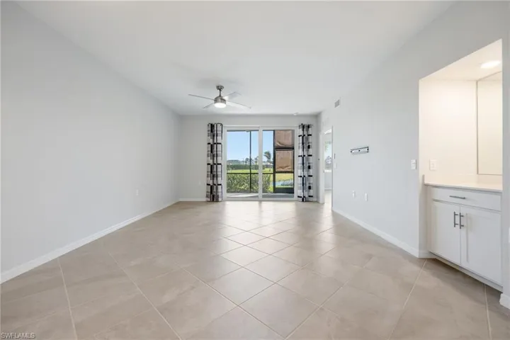 Welcoming great room with sliders to the back lanai