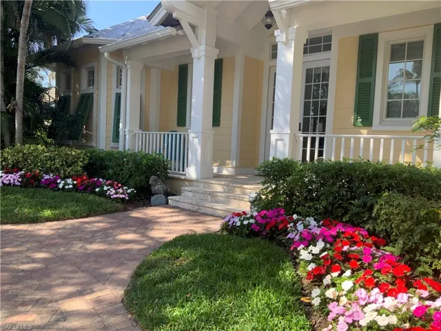 View of exterior entry featuring a porch