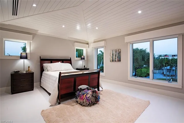Bedroom with wooden ceiling
