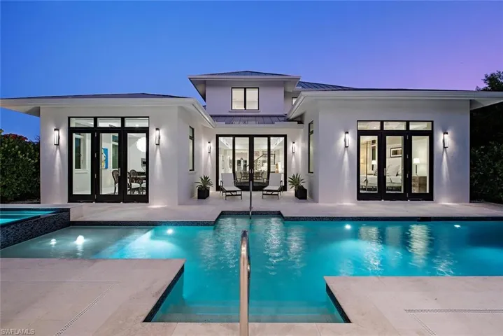 Back of house featuring french doors and a patio