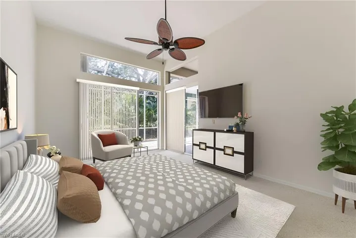 The primary bedroom is spacious and offers sliders for direct access to the large lanai.
