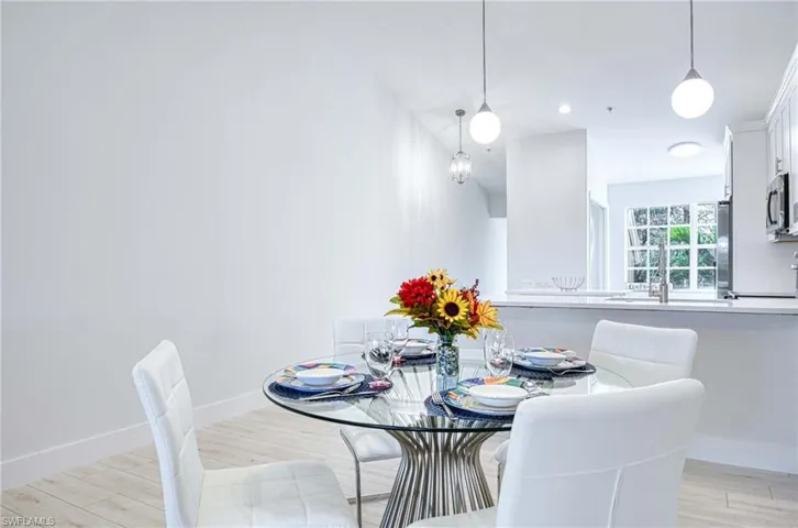 Dining space featuring wood finish floors