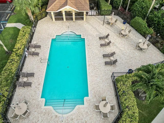 Community pool with a patio area