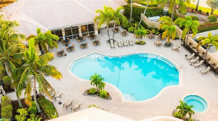 Community pool featuring a patio area