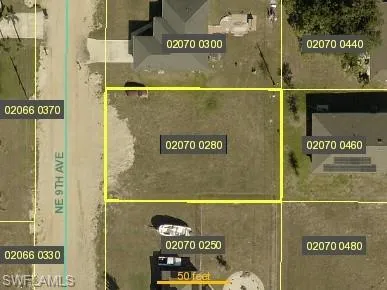 Aerial map of property and surrounding area with property parcel outlined