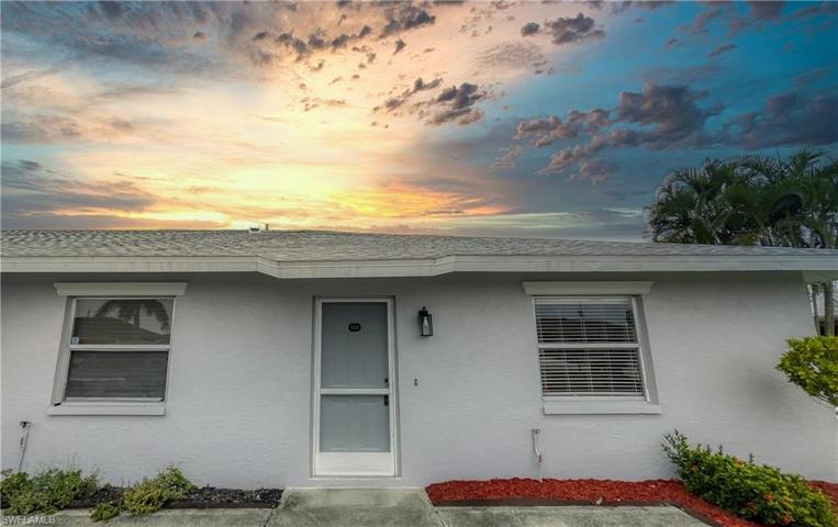 Front Door- Corner Unit- right by assigned parking space.