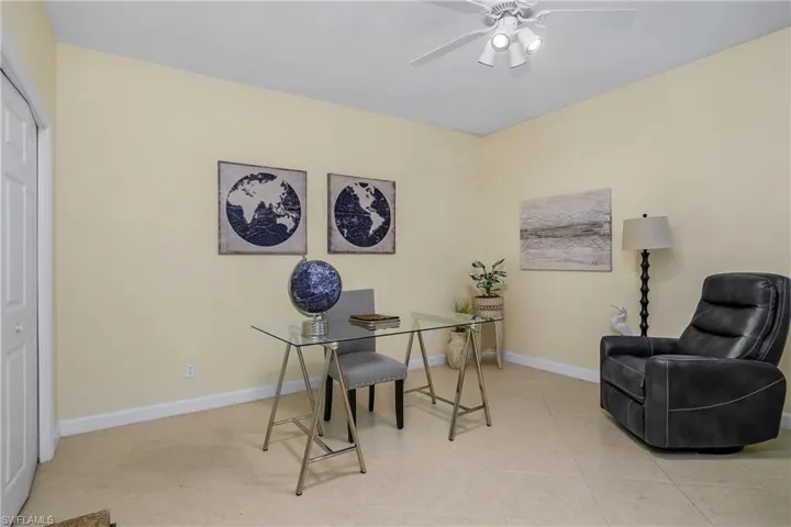 Tiled home office with ceiling fan