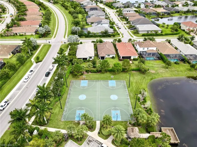 Bird's eye view with a water view and a residential view