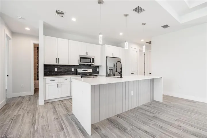 613 NW 7th  PL, Cape Coral, FL 33993